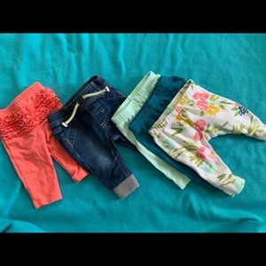 5 pair of newborn girls pants.